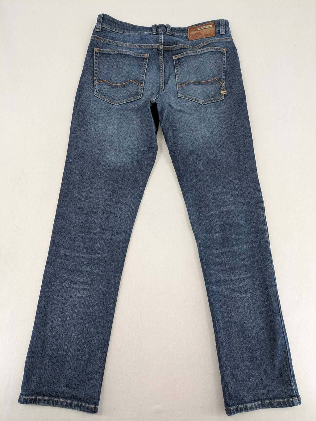 Camel Active blue straight jeans with classic 5-pocket design and logo patch.