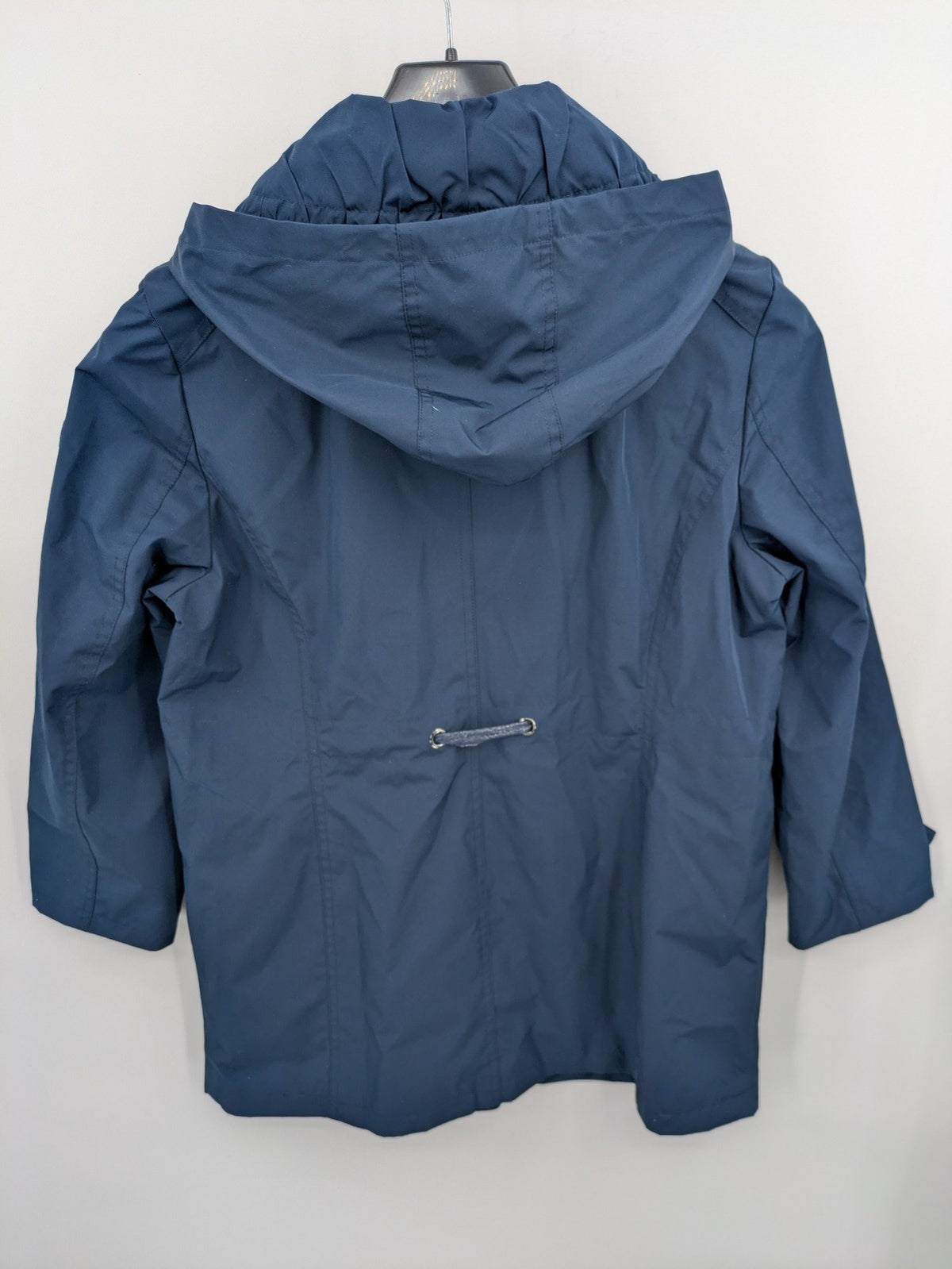 everYou navy parka jacket with hood, adjustable drawstring, patterned lining, button closure.