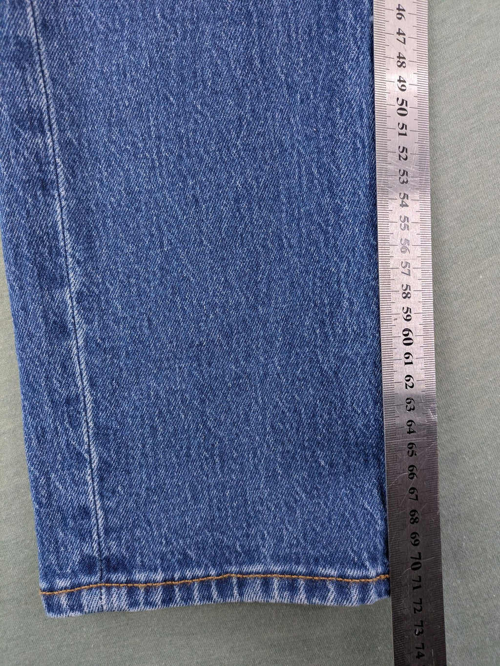 Selected Homme blue straight fit jeans with classic five-pocket design and medium wash denim.