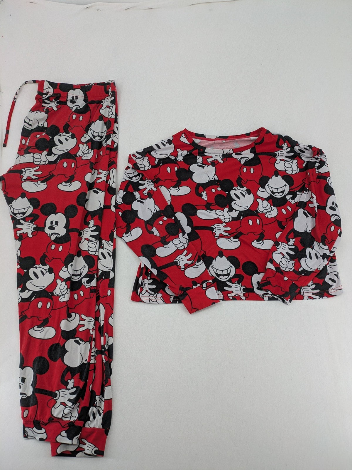 Disney loungewear set red and black with allover Mickey Mouse print and long sleeves.