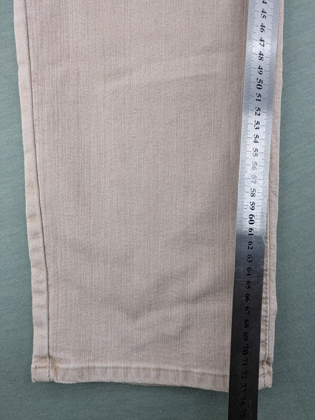 Angels beige straight leg jeans with five-pocket design and zipper button closure.