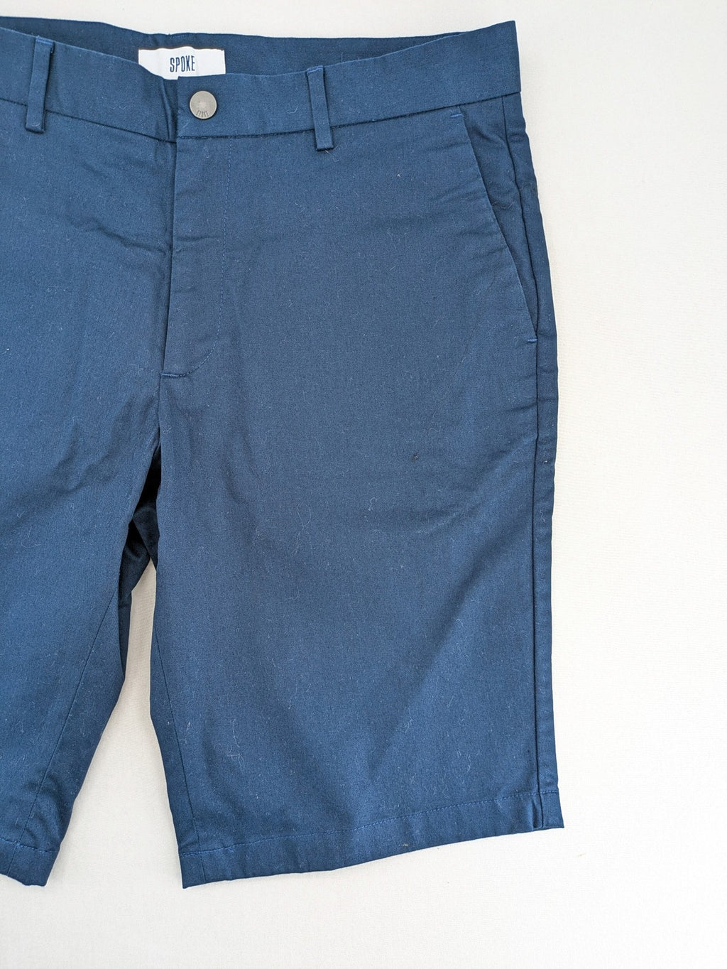 Spoke navy chino shorts flat front with unique printed pocket lining.