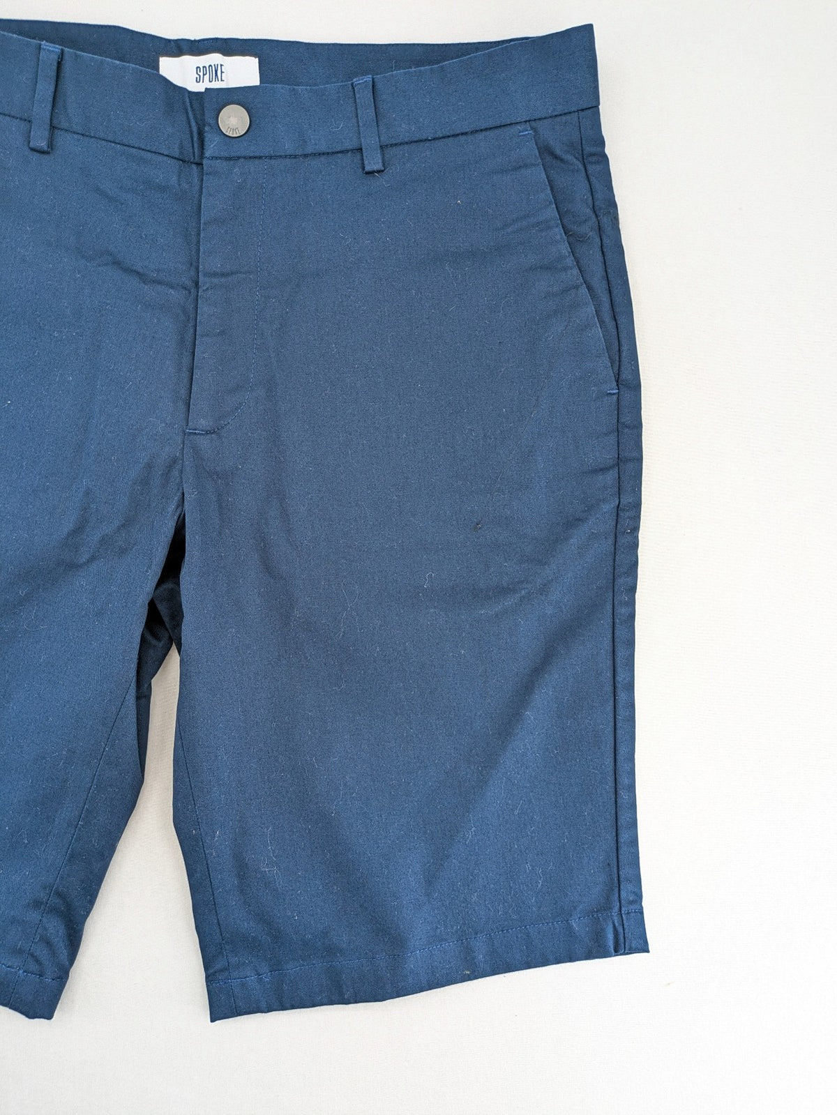 Spoke navy chino shorts flat front with unique printed pocket lining.