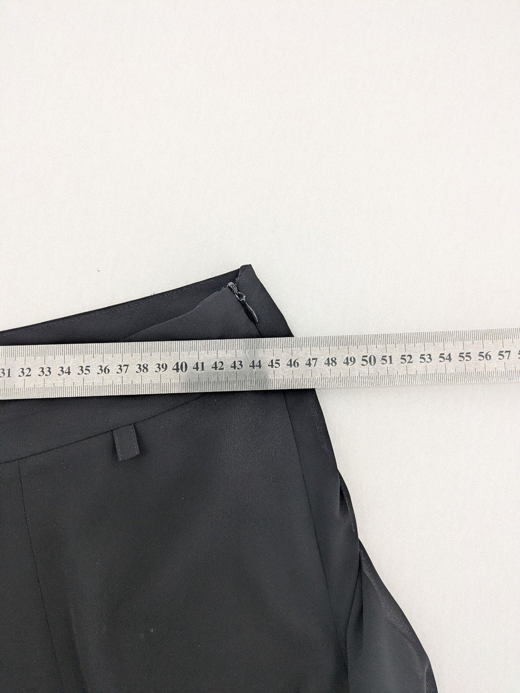 Gerry Weber grey palazzo pants with chiffon overlay and front slits.