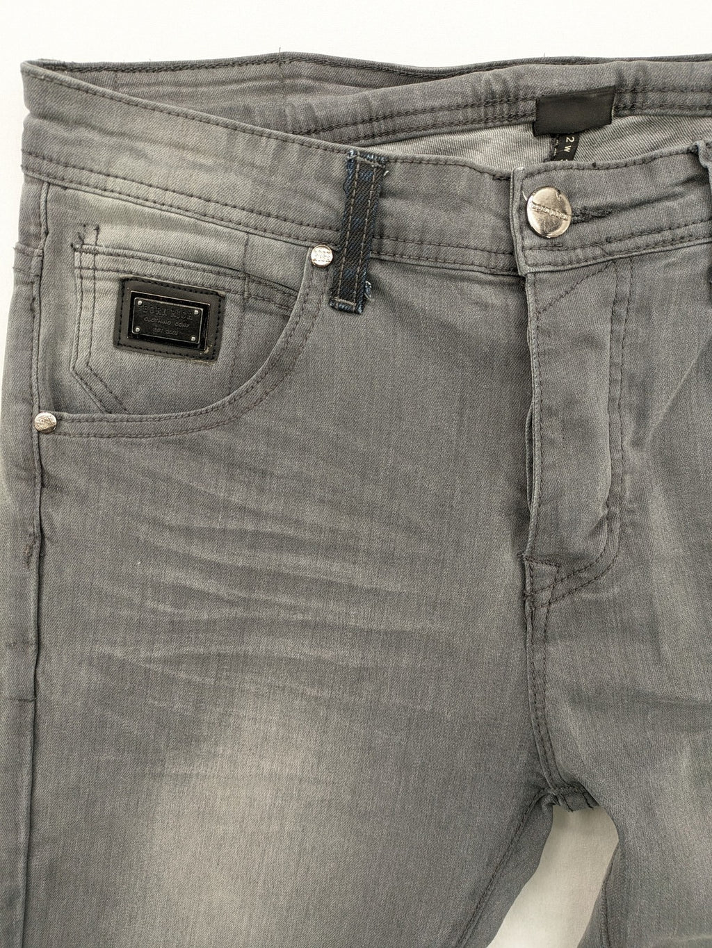Born Rich grey slim fit jeans with button fly and washed denim texture.