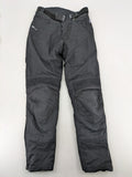 iXS black chaps with grey accents, waterproof textile, adjustable belt, reinforced knees.