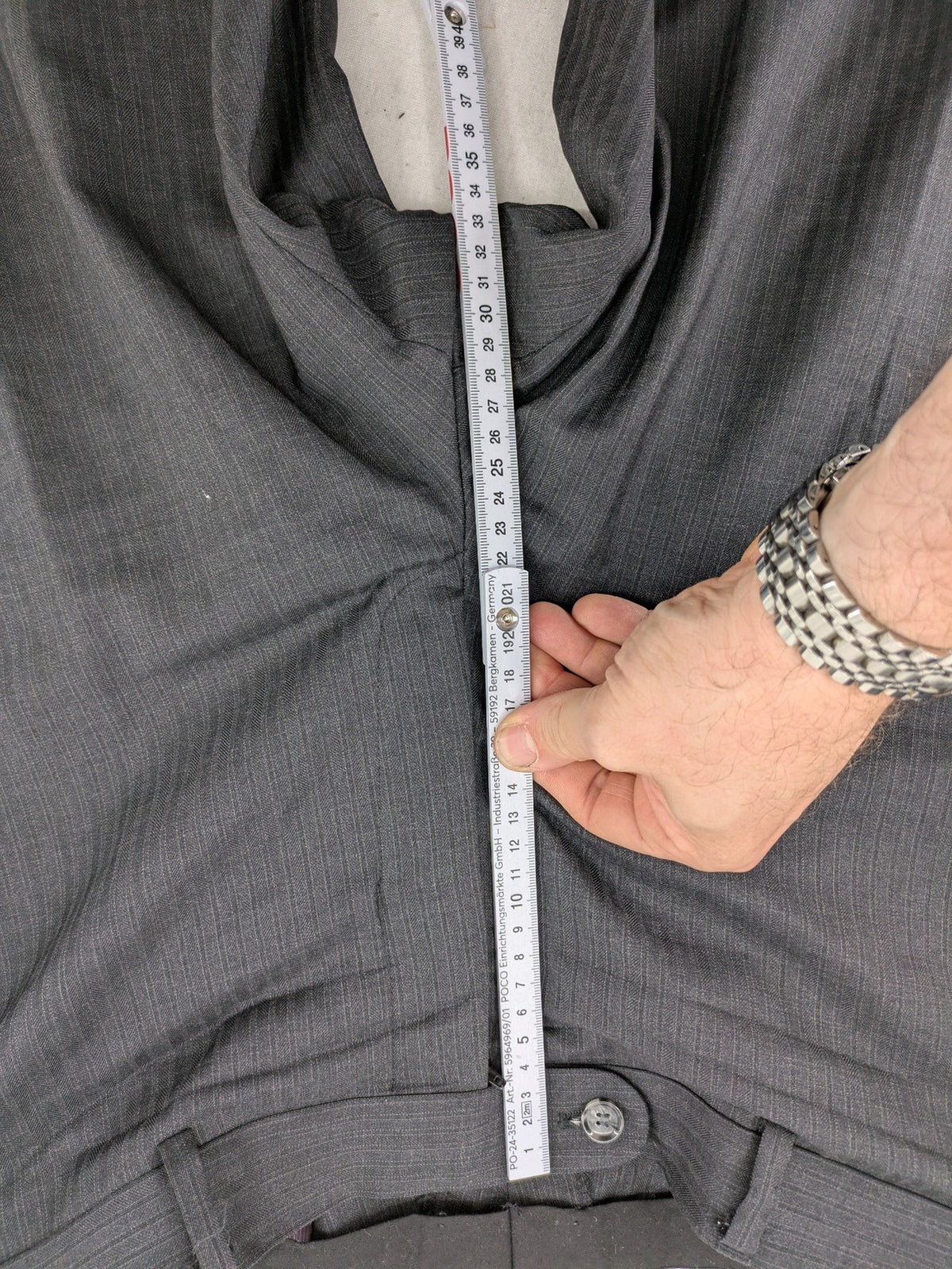 Desch grey suit pants with subtle pinstripe pattern and flat front design.