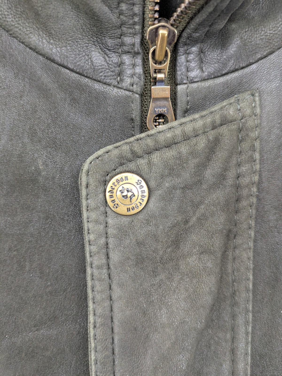 Sonderson grey leather jacket size 52, robust design with patterned lining and YKK zipper.