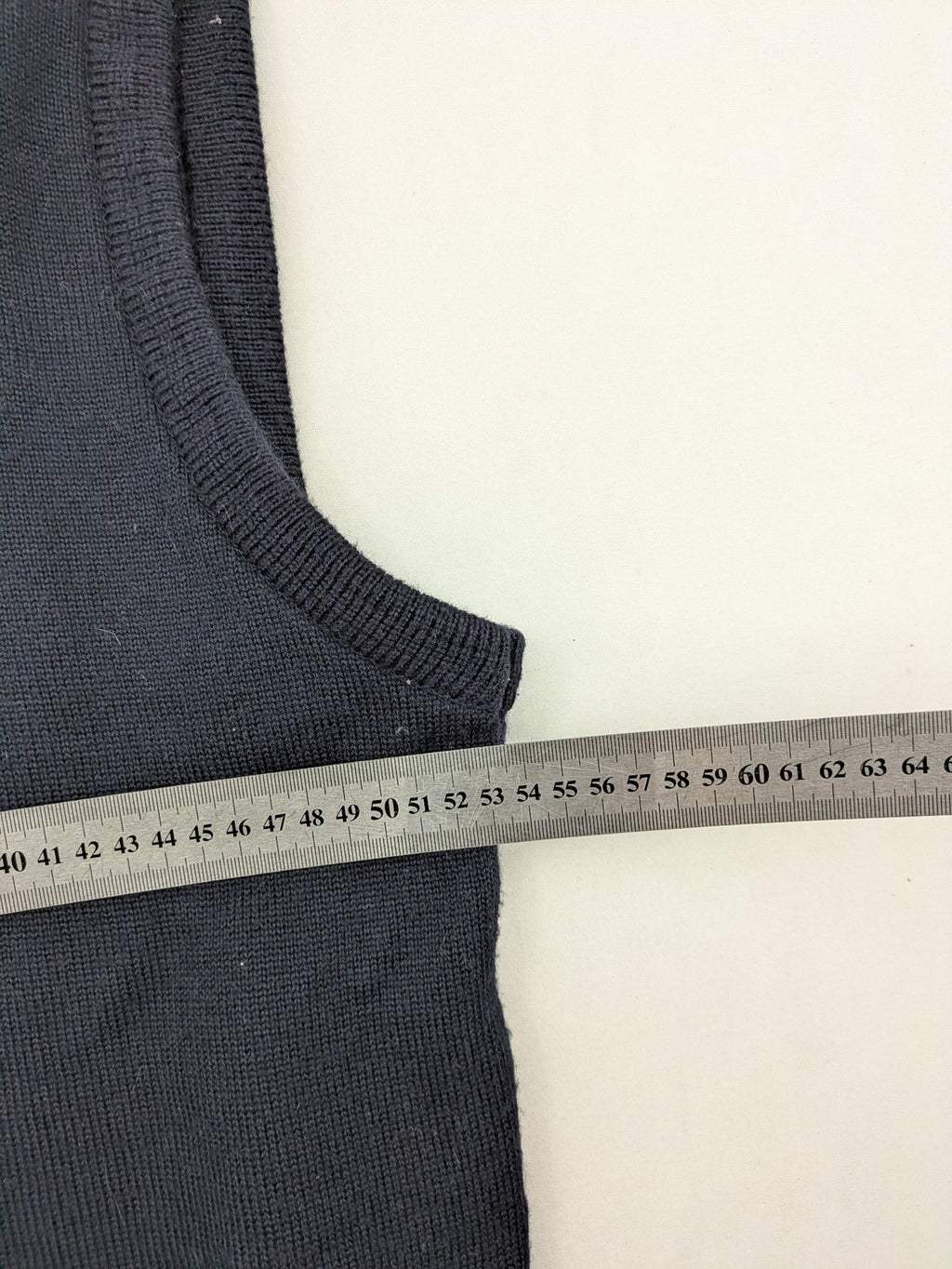Via Cortesa gold turtle neck jumper with structured pattern and V-neck design.