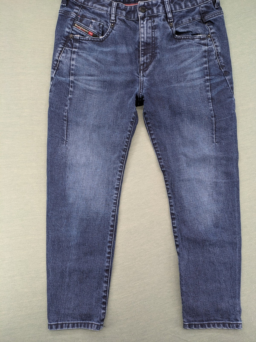 Diesel blue boyfriend jeans low waist dark wash stretch denim with logo patch.