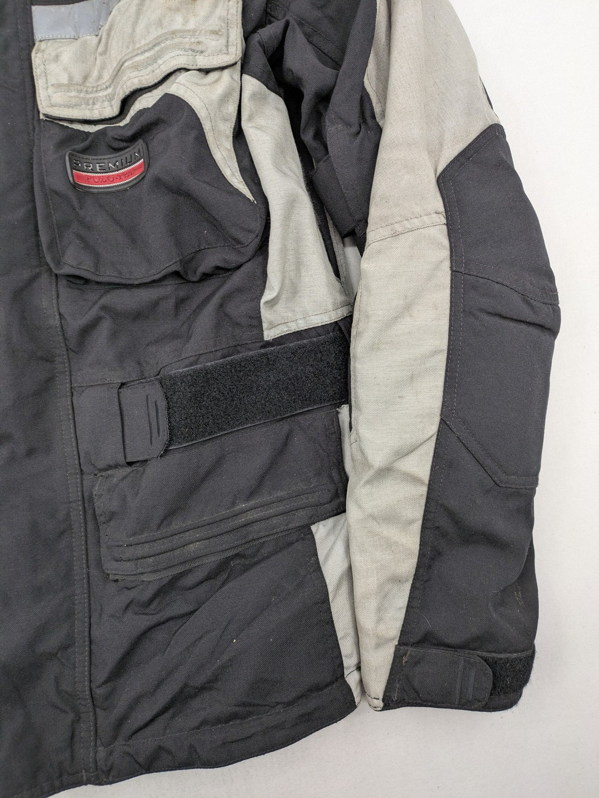 Polo motorcycle jacket cream durable Cordura fabric multiple pockets adjustable straps