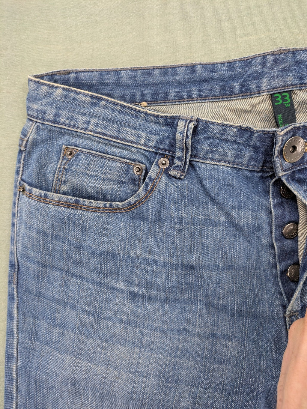 Benetton Jeans blue straight leg denim with button fly and classic design.