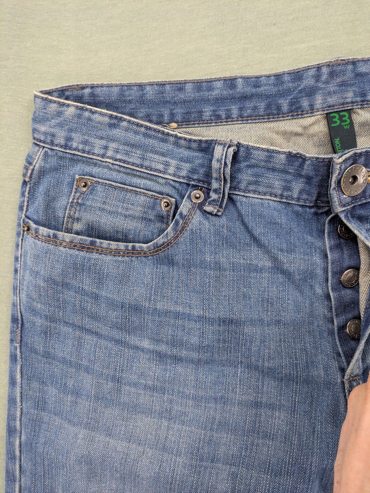 Benetton Jeans blue straight leg denim with button fly and classic design.