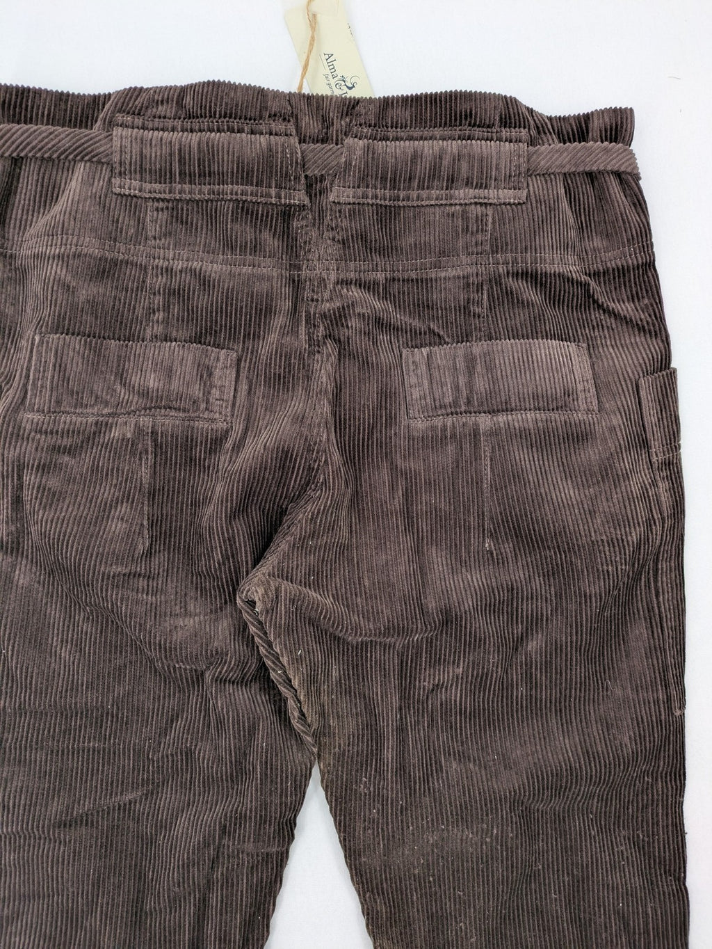Alma & Lovis brown cord pants with drawstring, casual fit, and patch pockets.