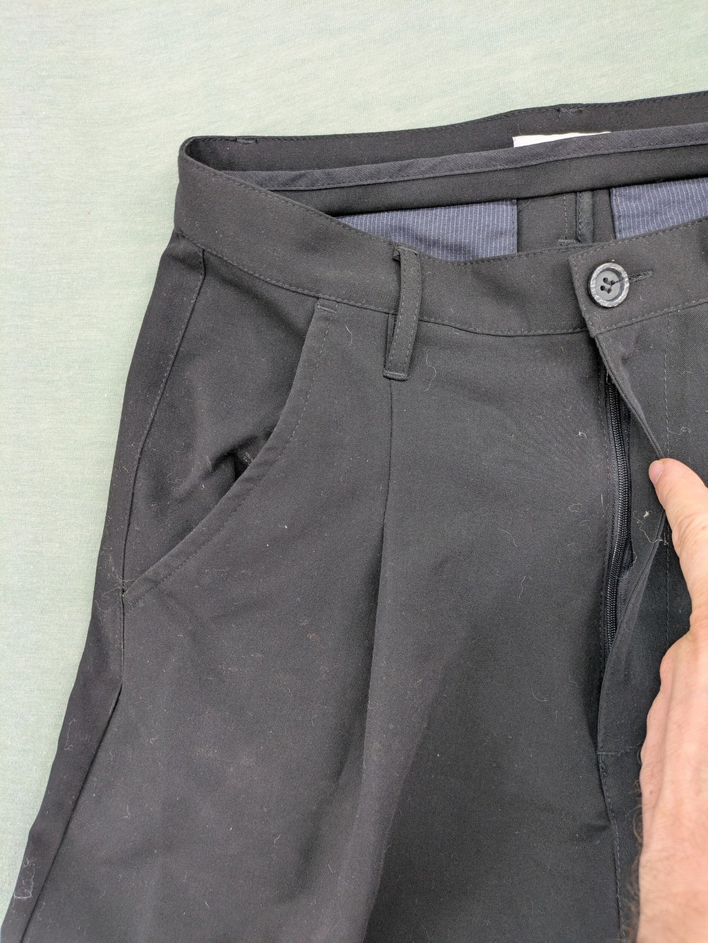 Jenny Joy pink harem pants with pleats, side pockets, and tapered legs.