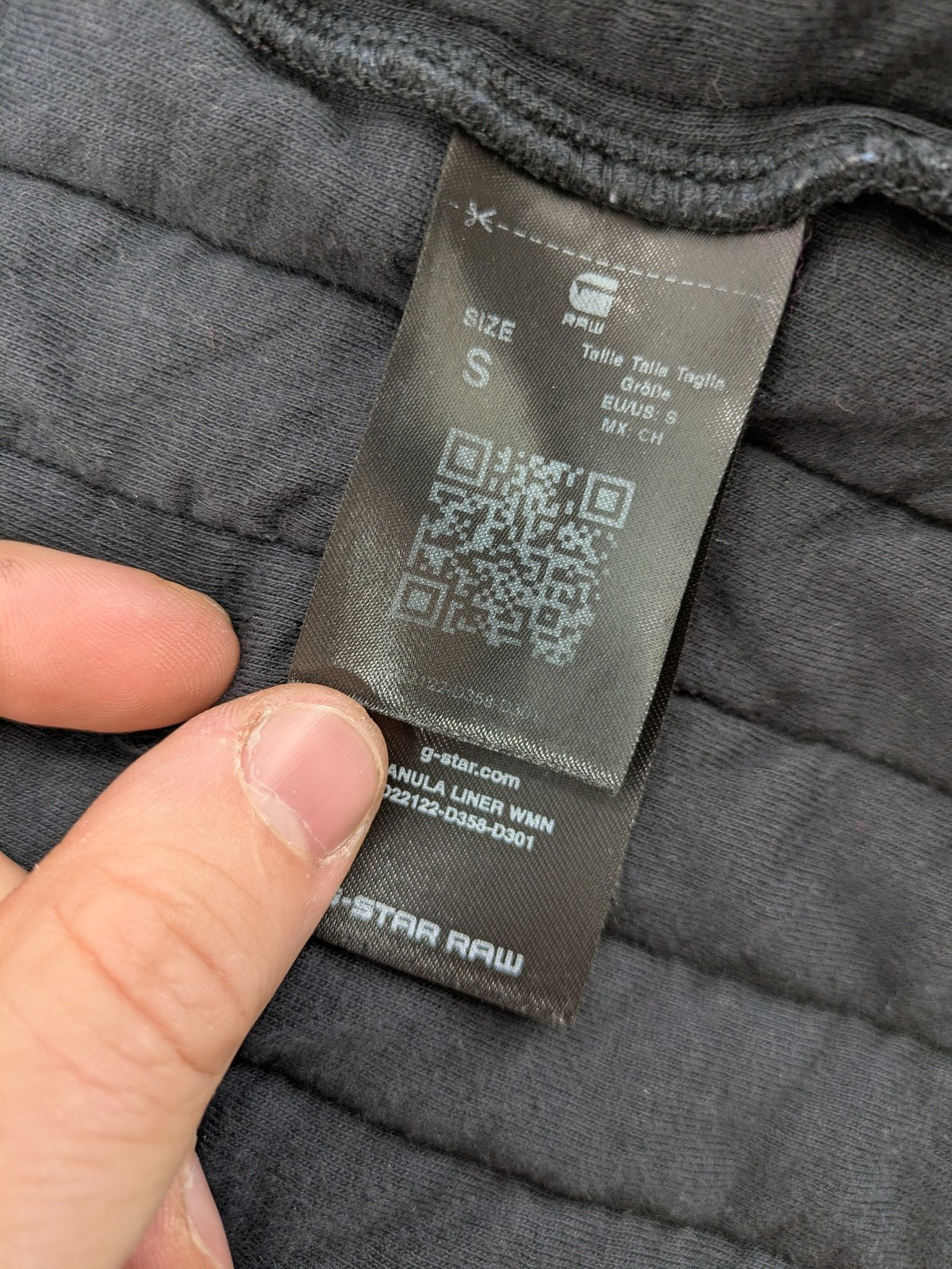 G-Star Raw grey quilted jacket with button closure and adjustable drawstring hem.