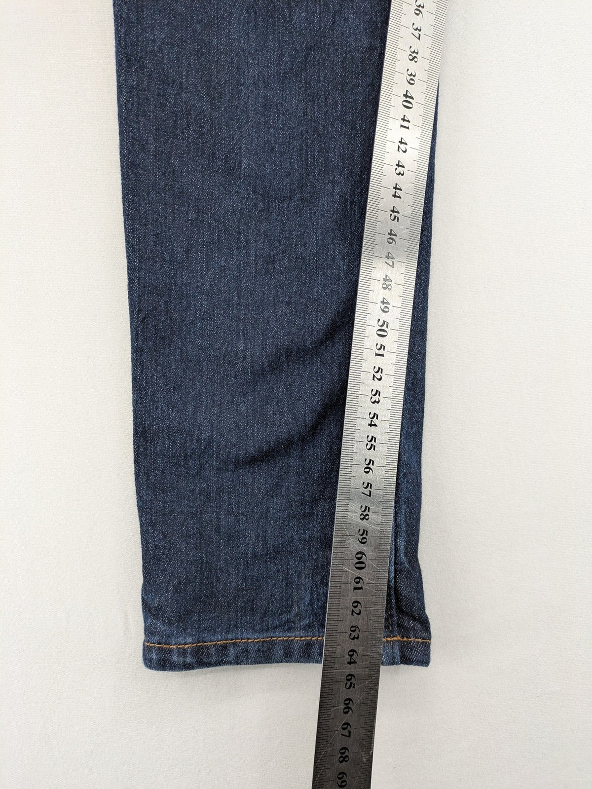 H&M blue skinny fit jeans with classic 5-pocket style and button closure.