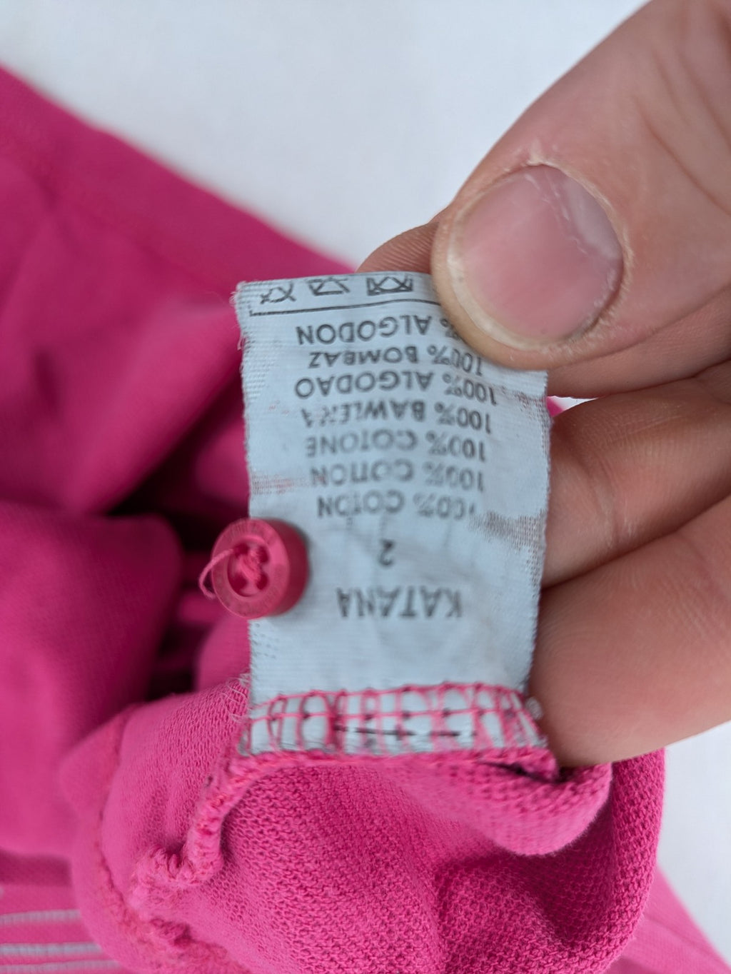 Geographical Norway pink polo shirt with embroidered Saint Malo design and Gingham trim.