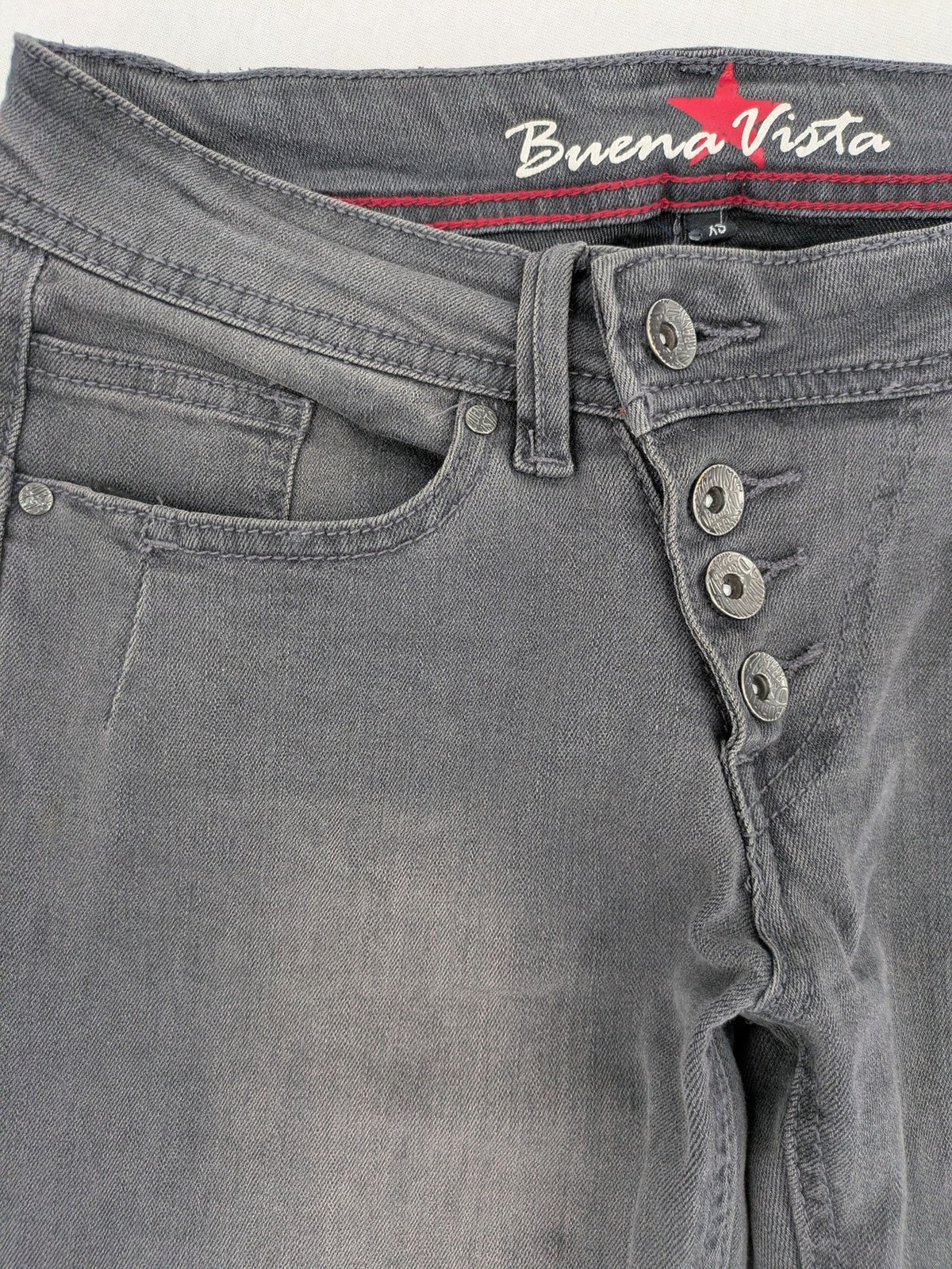 Buena Vista grey skinny jeans with button fly and stretch denim material.
