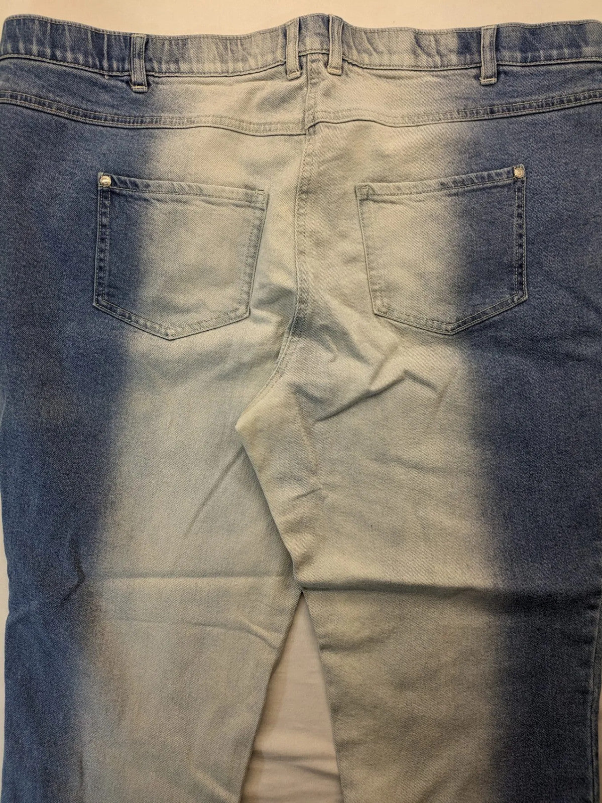 Ulla Popken blue straight jeans with used look, elastic waistband, and 5-pocket style.