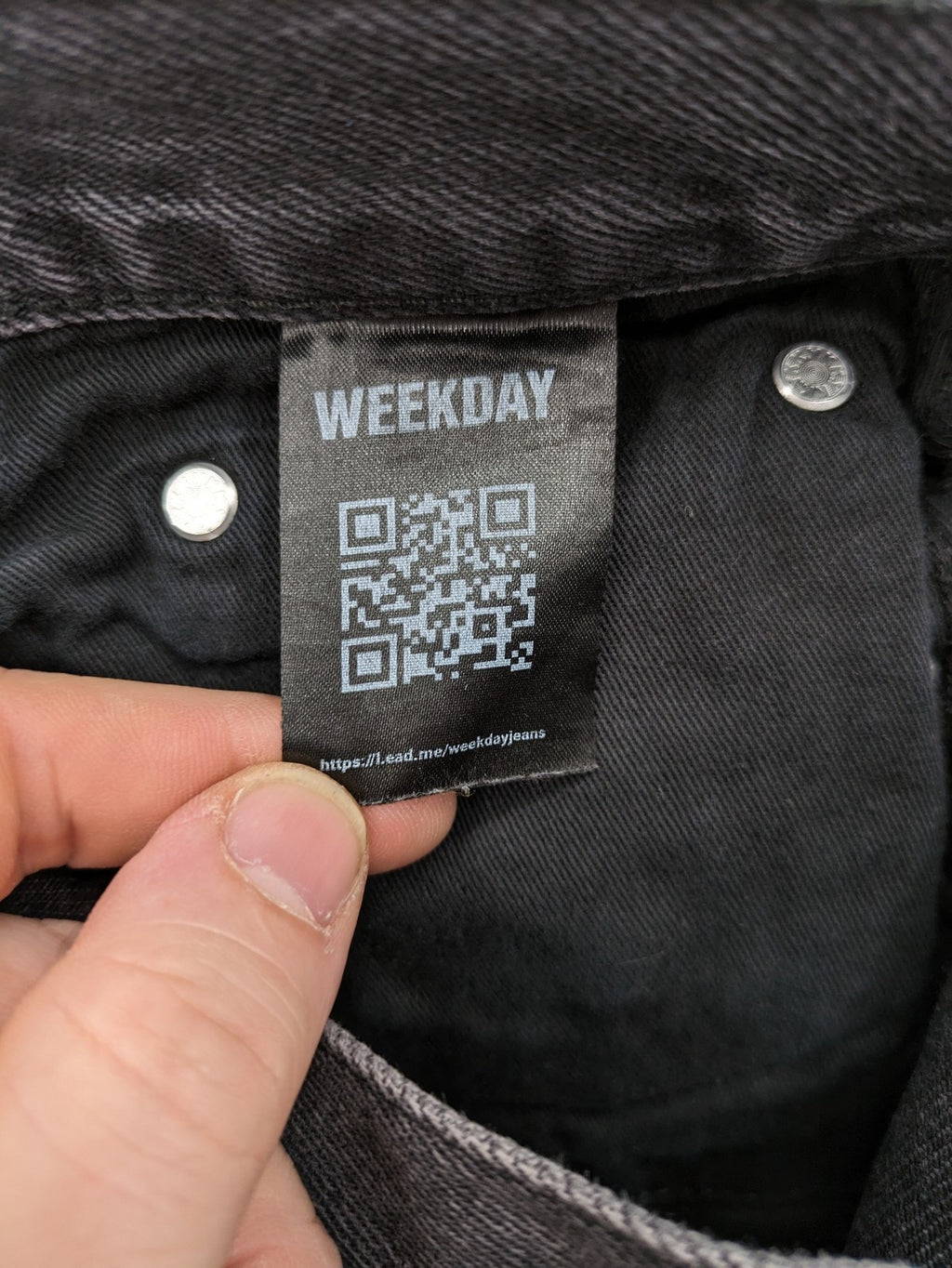 Weekday grey straight jeans with button fly and classic denim design.