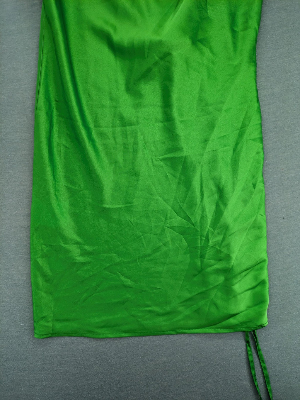 Amisu green satin slip dress with waterfall neckline and adjustable side ruching.