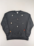 Zara grey turtle neck jumper with skull, scorpion, flame, and eagle embellishments.