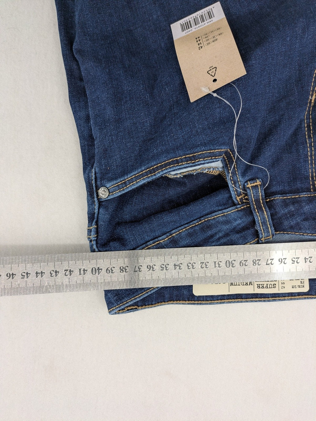 ESMARA blue super skinny jeans with dark wash and stretch denim material.