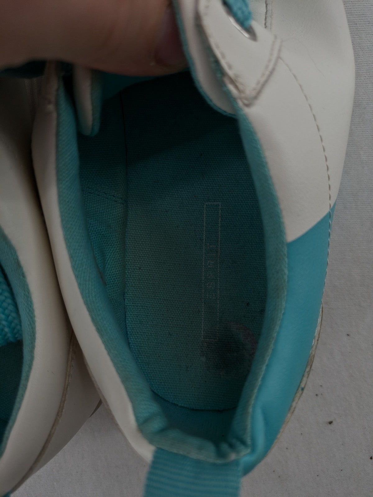 Esprit women's sneakers white with turquoise accents and wide laces.