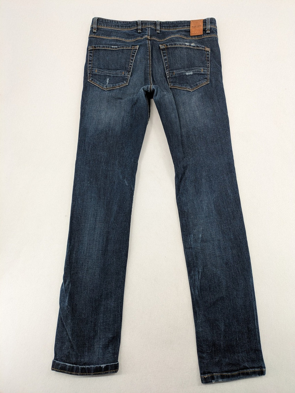 Lufian blue straight jeans dark wash distressed 5-pocket style with stretch denim.