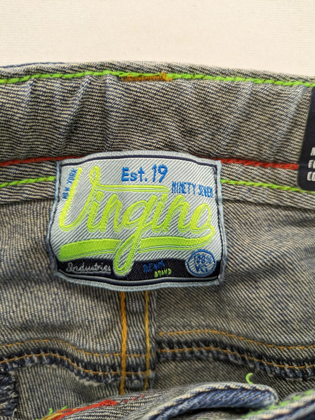 Vingino blue straight jeans medium wash 5-pocket design with zipper fly and stretch denim.