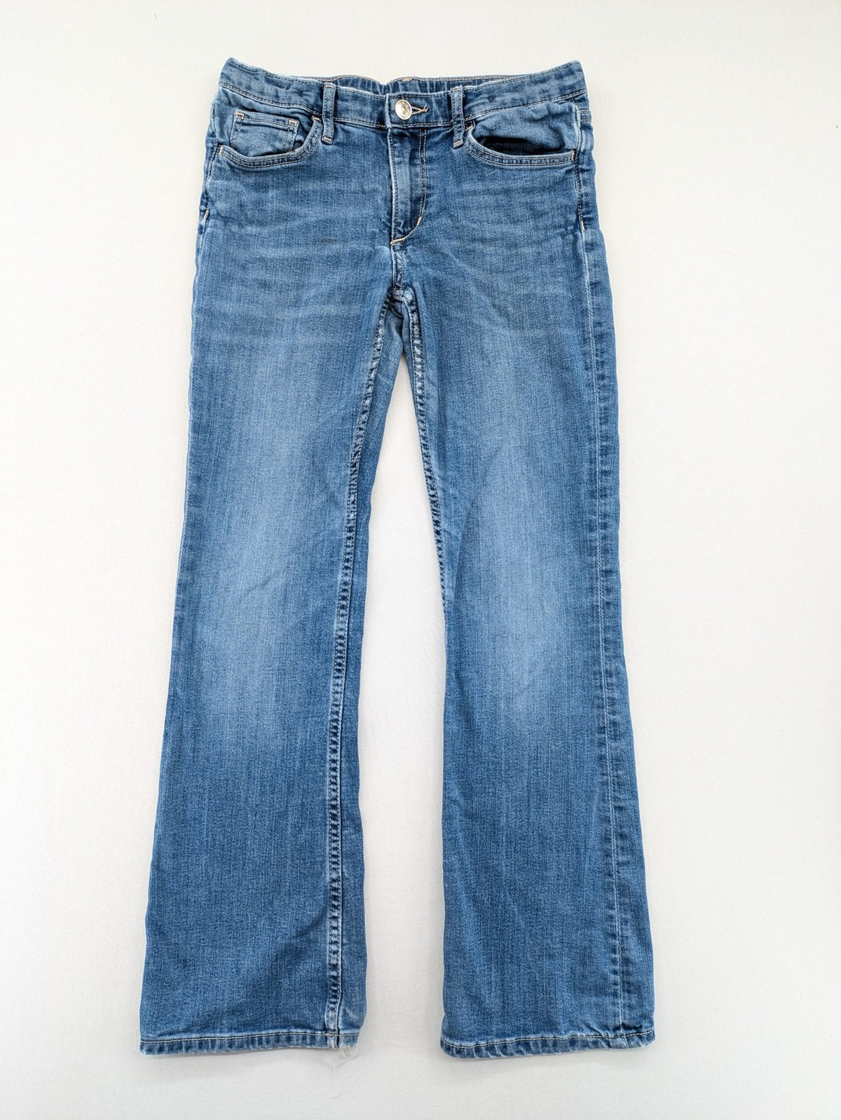 H&M blue bootcut jeans size 146, medium wash, stretch denim material.