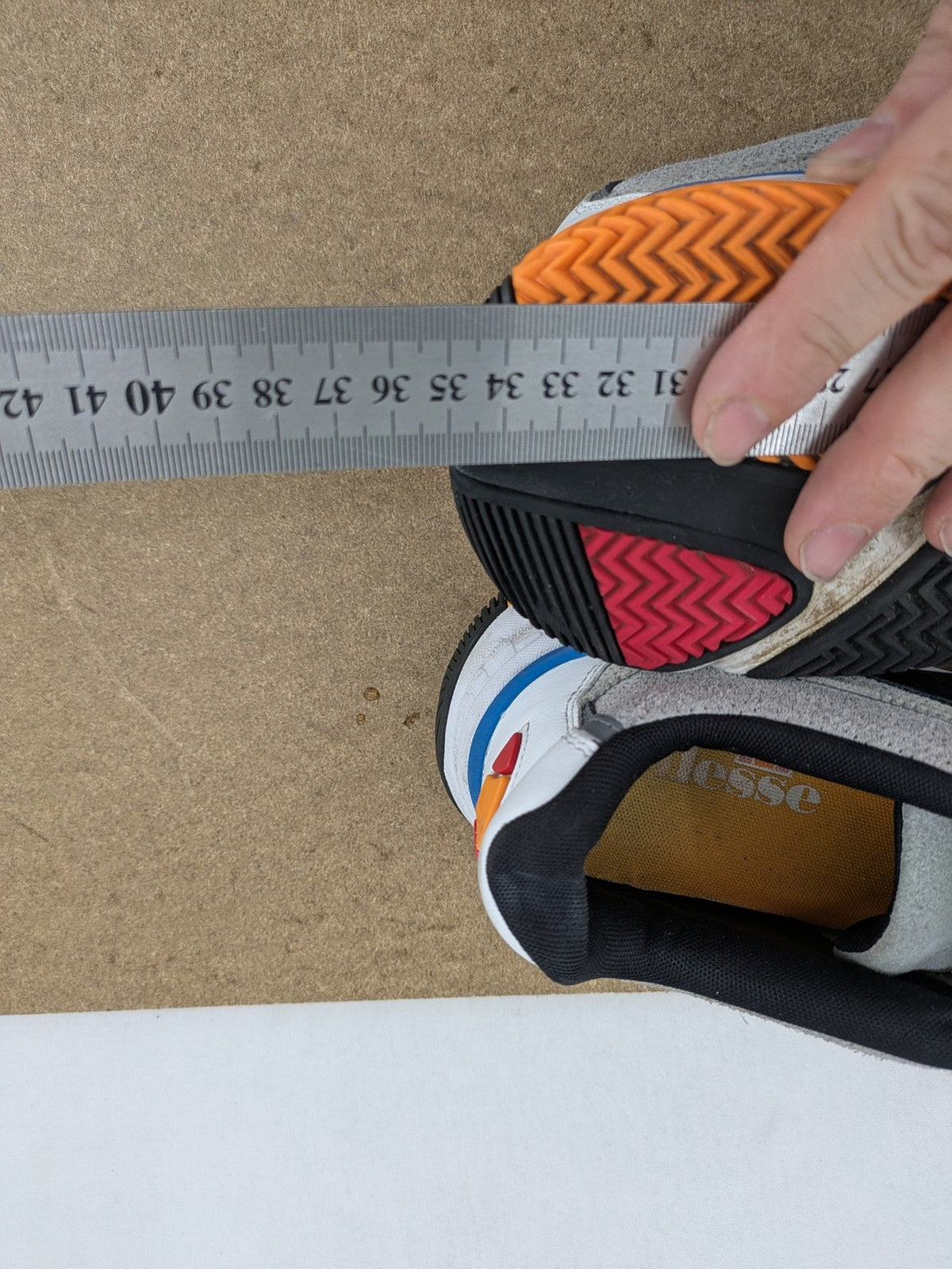 Ellesse Aurora chunky sneakers white grey with orange accents and multi-material upper.