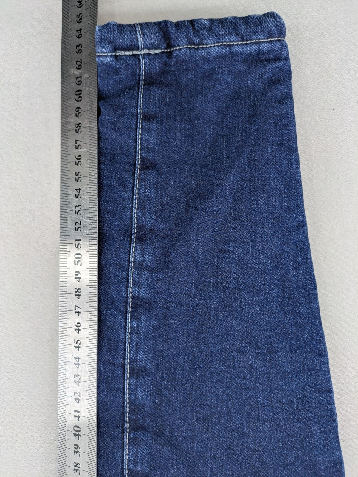 Valentine Meinn blue straight jeans with elastic waistband and soft lining, classic denim look.