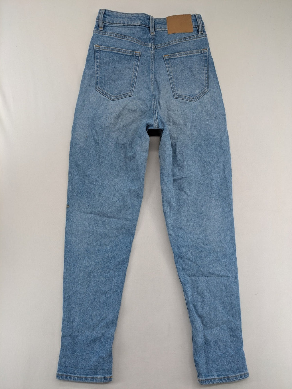 H&M Divided blue mom jeans high waist tapered fit with classic wash and durable cotton blend.
