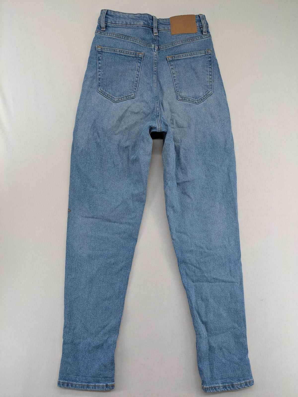 H&M Divided blue mom jeans high waist tapered fit with classic wash and durable cotton blend.