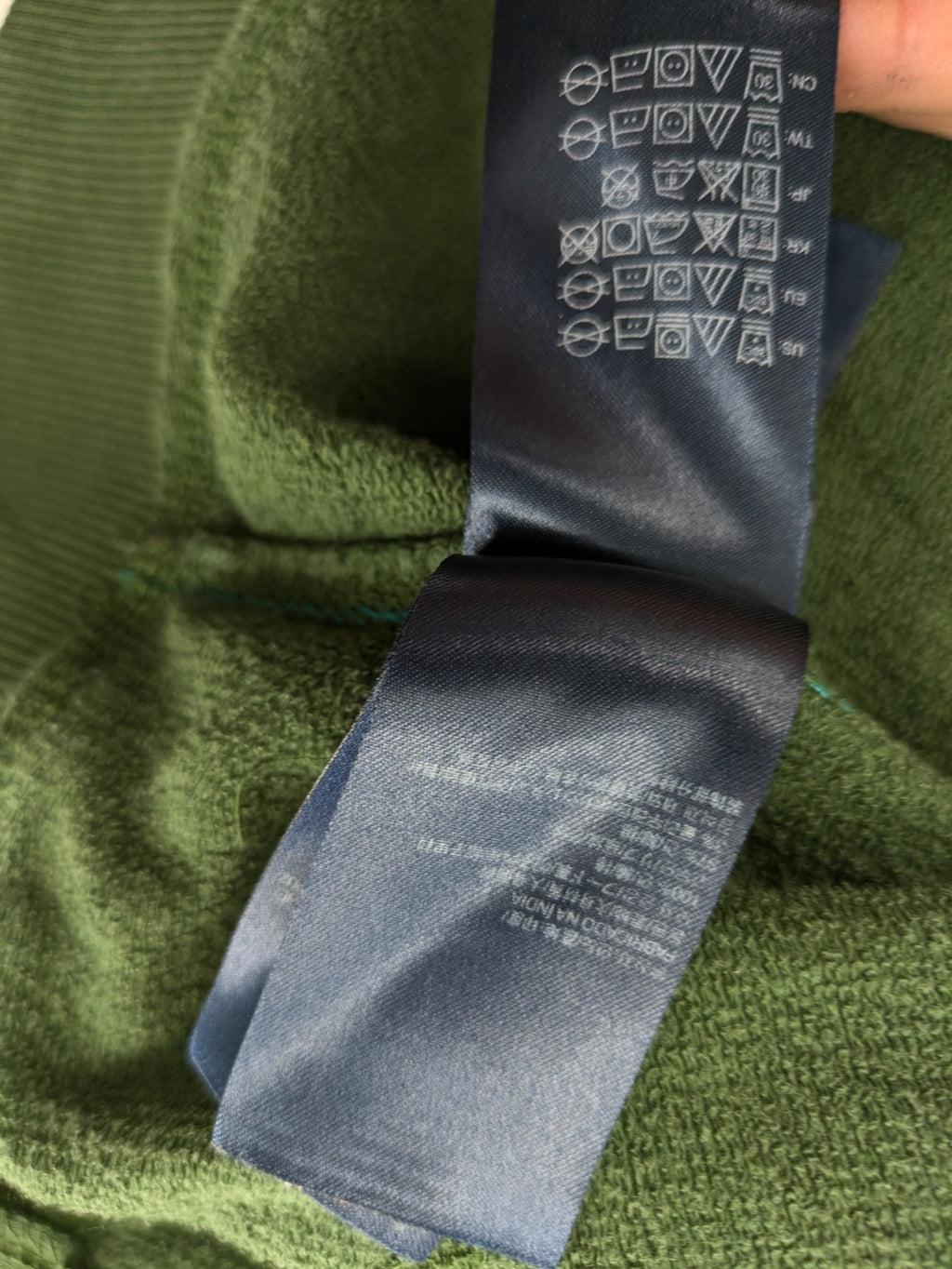 Tommy Hilfiger Denim green hoodie full zip with large graphic logo and grey waffle lining.
