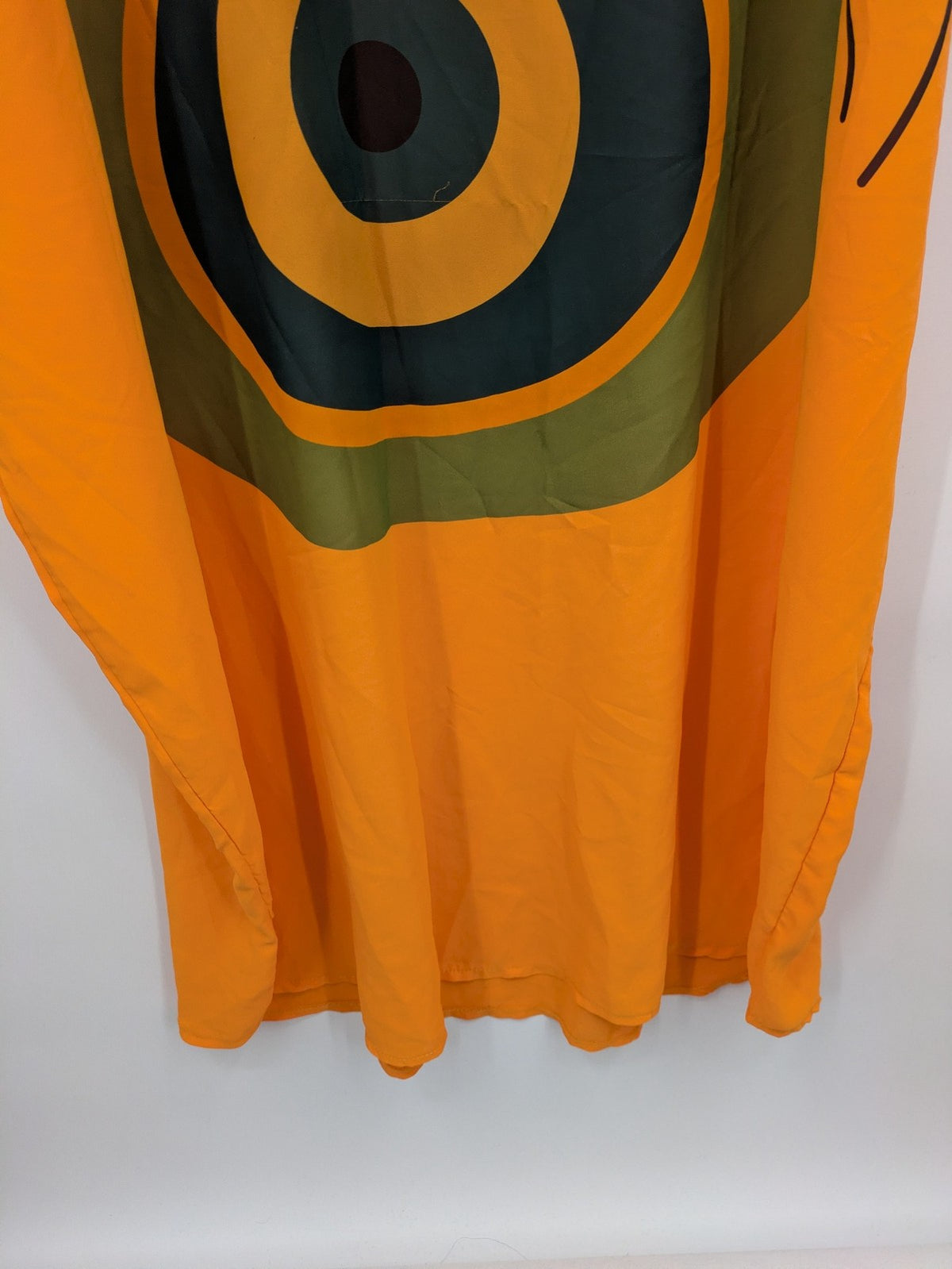 Kaftan orange oversized summer dress with unique graphic print and long sleeves.