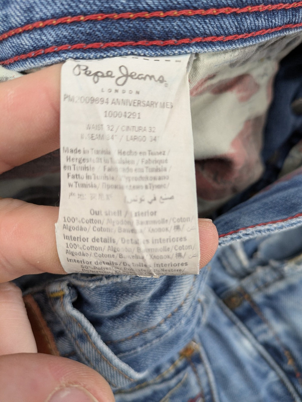 Pepe Jeans blue straight jeans with Union Jack embroidery and distressed denim finish.