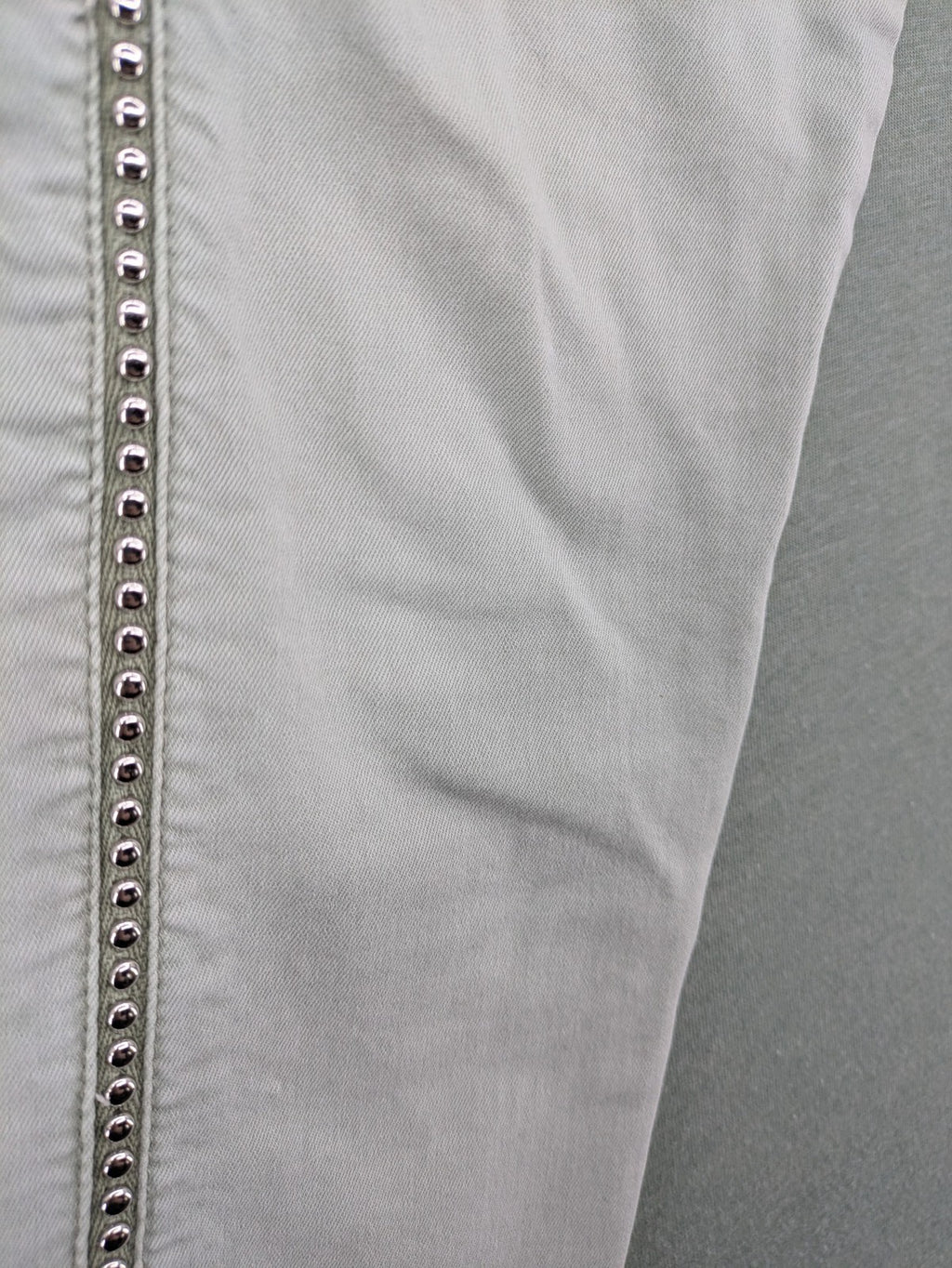 Jewelly grey straight jeans slim fit with silver decorative studs along side seams.