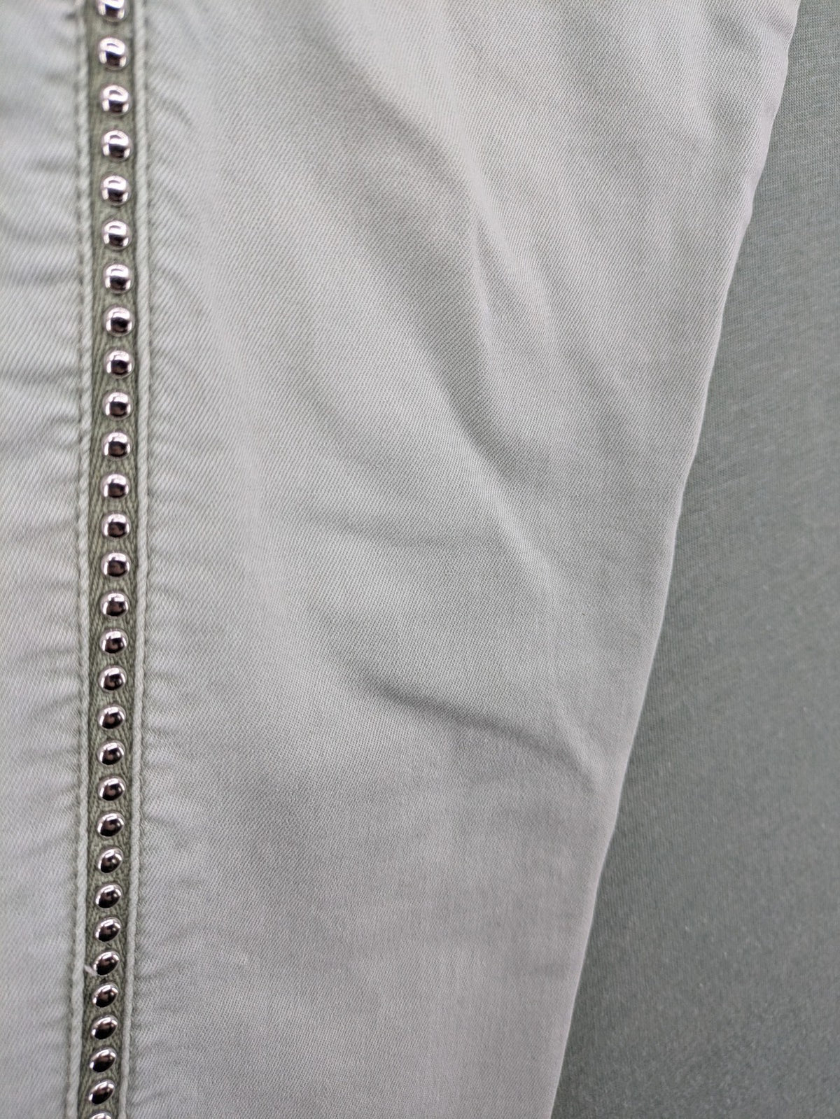 Jewelly grey straight jeans slim fit with silver decorative studs along side seams.