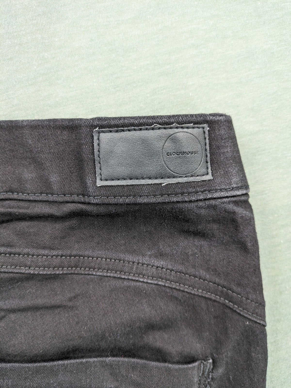 Clockhouse black jeggings mid rise pull-on style with elastic waistband and stretch material.