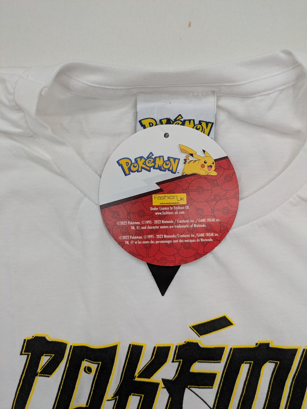 Pokemon graphic t-shirt white comic print featuring Pikachu, Charizard, Blastoise, Venusaur.