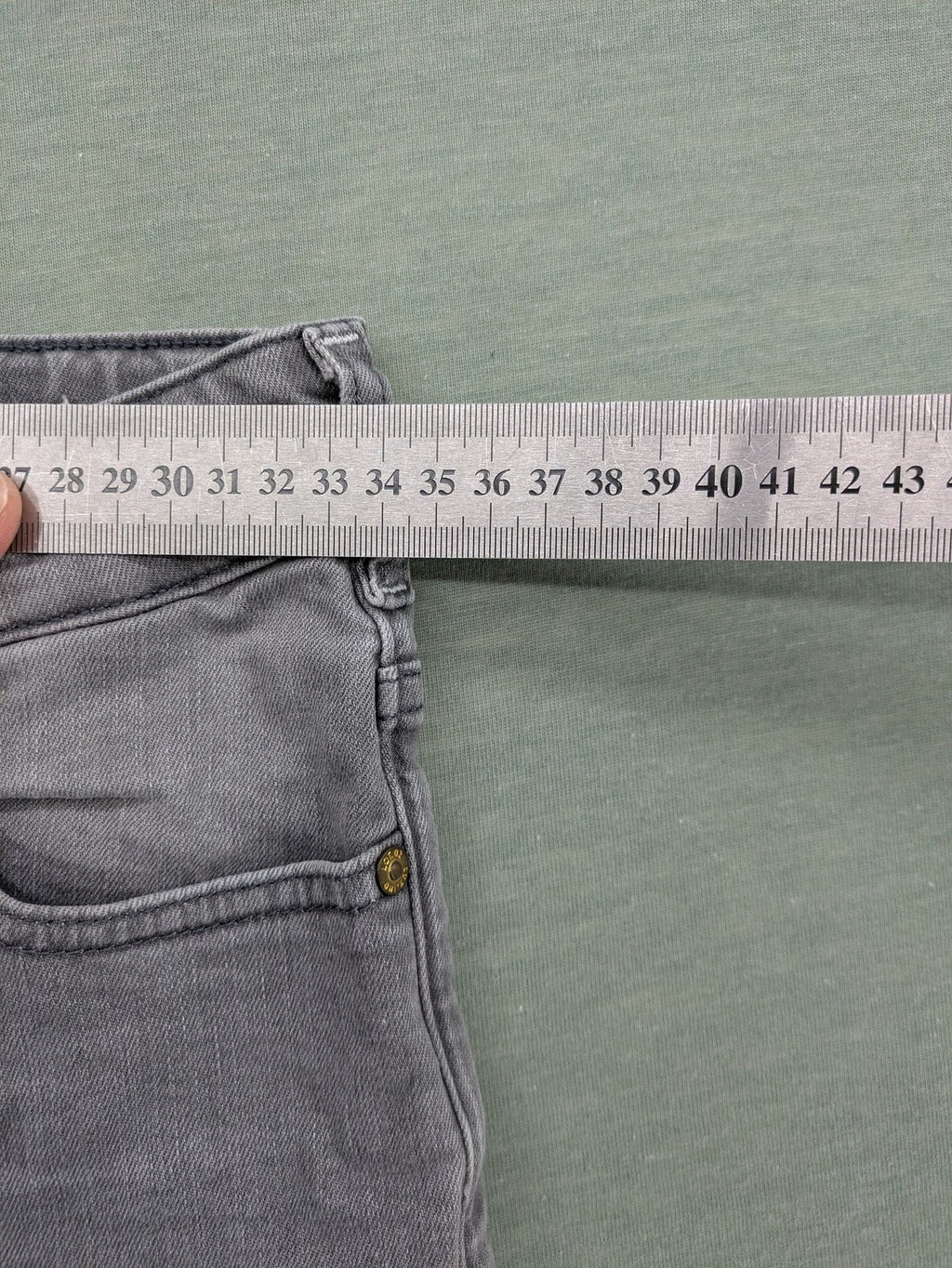 Scotch & Soda grey straight jeans with classic five-pocket design and logo patch.