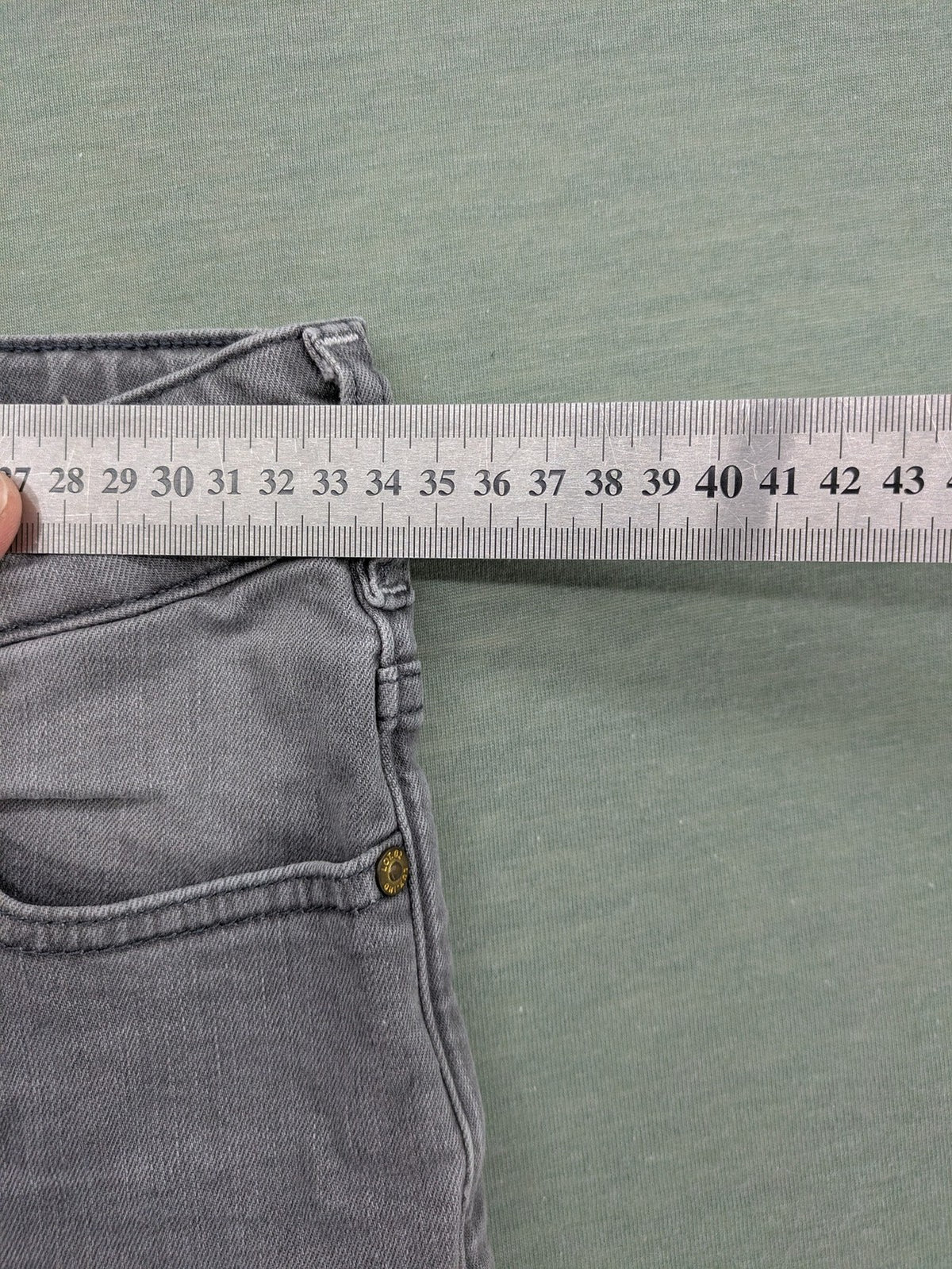 Scotch & Soda grey straight jeans with classic five-pocket design and logo patch.