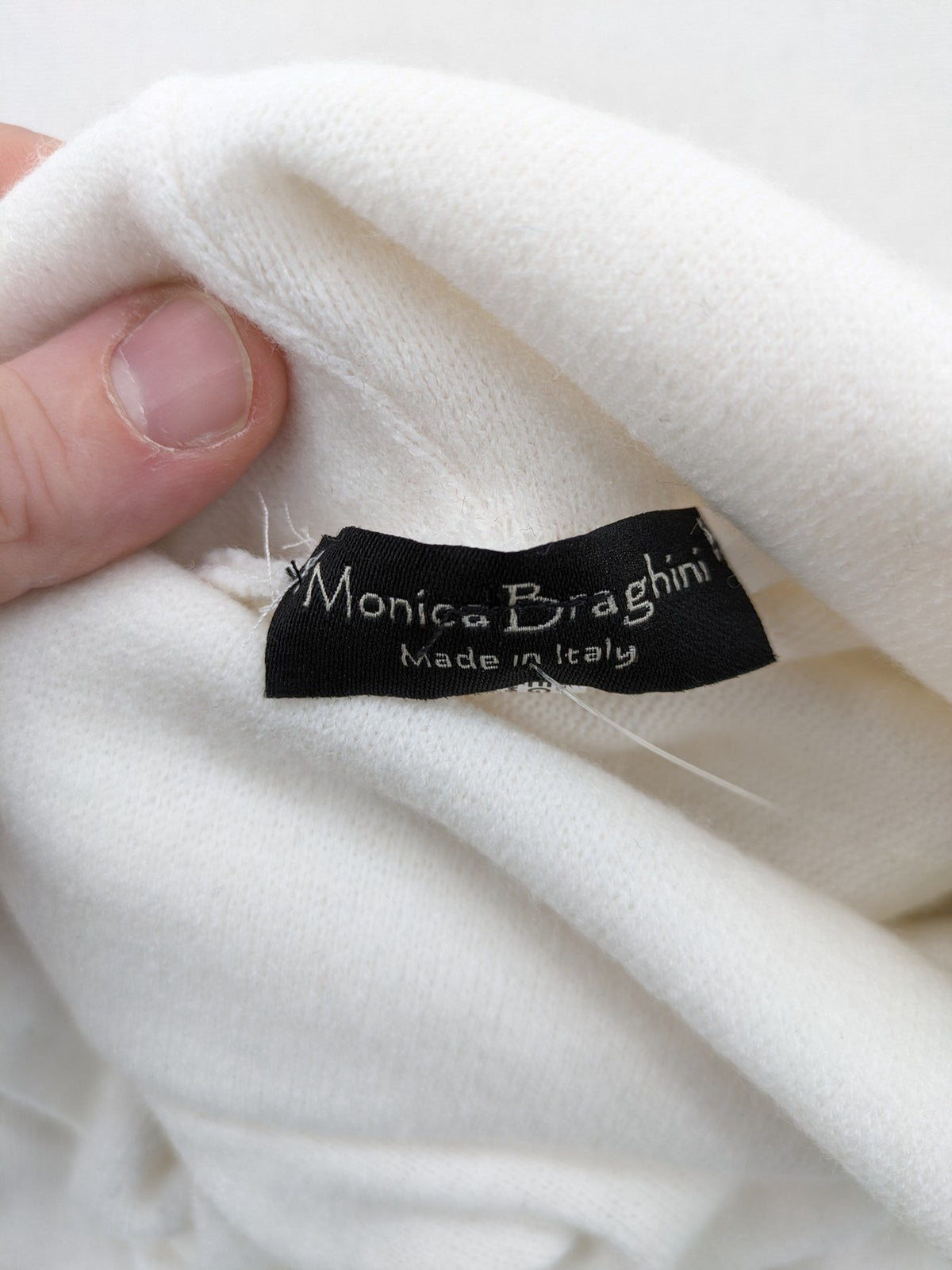 Monica Braghini white turtle neck jumper soft fabric classic design with high collar.