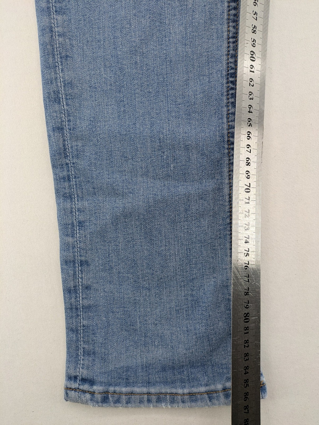 Jack & Jones blue slim jeans with button fly and subtle used look.