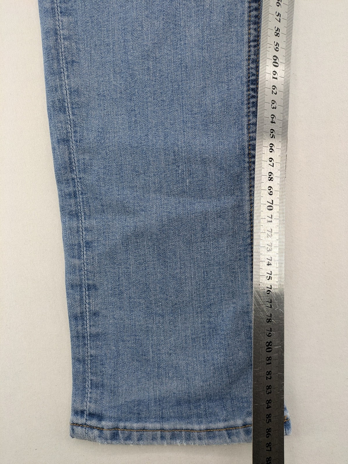 Jack & Jones blue slim jeans with button fly and subtle used look.
