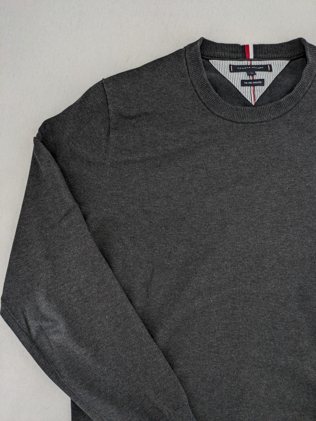 Tommy Hilfiger grey turtle neck jumper with embroidered flag logo on chest.