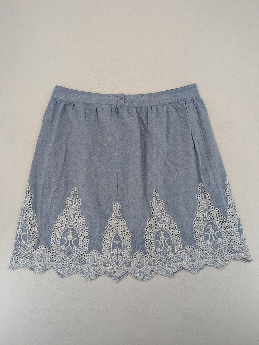 Yessica C&A blue A-line dress with white lace embroidery and side zipper.
